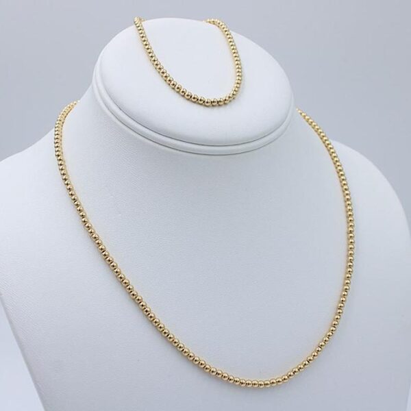18 karat solid gold bead necklace and bracelet set